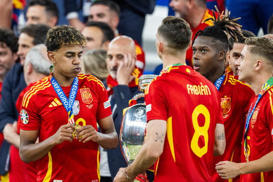 Lamine Yamal and Nicholas Williams of Spain celebrate with
