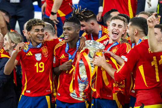 Lamine Yamal and Nicholas Williams of Spain celebrate with