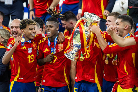 Lamine Yamal and Nicholas Williams of Spain celebrate with