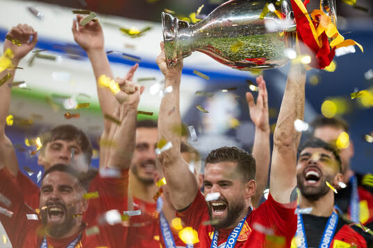 Nacho of Spain celebrates with the trophy