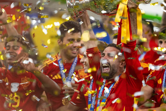 Daniel Carvajal of Spain celebrates with the trophy
