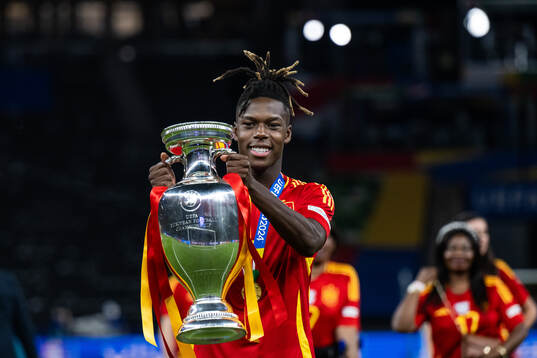 Nicholas Williams of Spain celebrates with the trophy