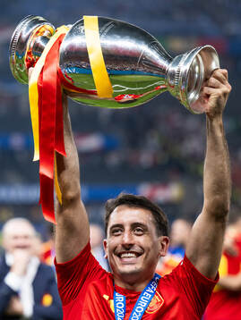 Mikel Oyarzabal of Spain celebrates with the trophy