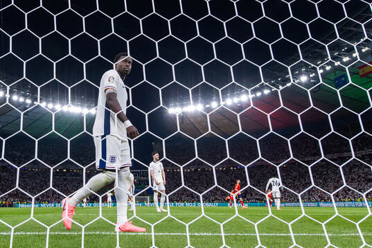 Marc Guehi of England looks dejected