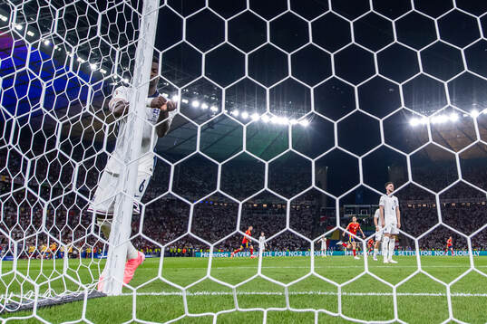 Marc Guehi of England looks dejected