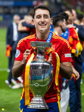 Mikel Oyarzabal of Spain celebrates with the trophy