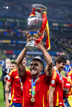 Martin Zubimendi of Spain celebrates with the trophy