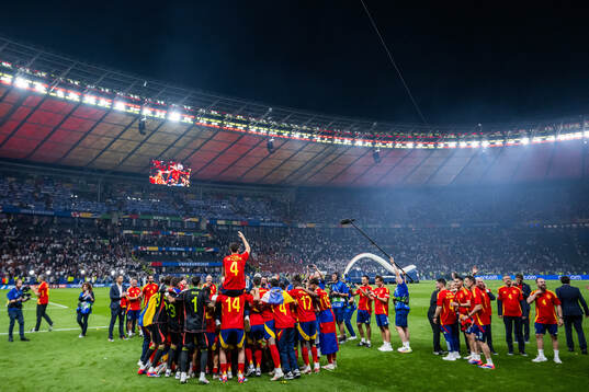 Players of Spain celebrate