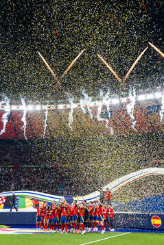 Players of Spain celebrate with the trophy