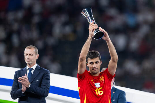 Rodrigo Hernandez of Spain celebrates with the Best Player
