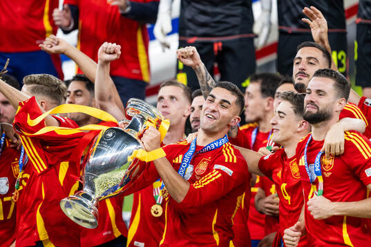 Ferran Torres of Spain celebrates with the trophy