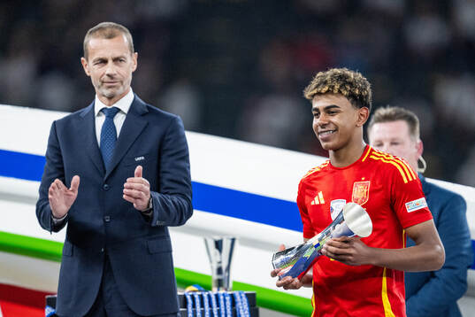 Lamine Yamal of Spain poses with the Best Young Player of