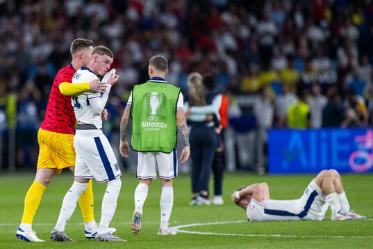 Cole Palmer of England looks dejected