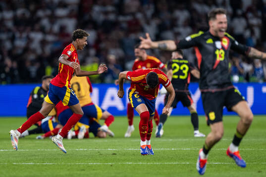 Lamine Yamal of Spain celebrates with team mates
