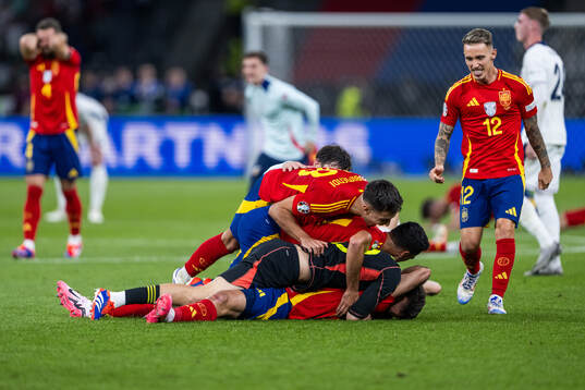 Martin Zubimendi and Alejandro Grimaldo of Spain celebrate