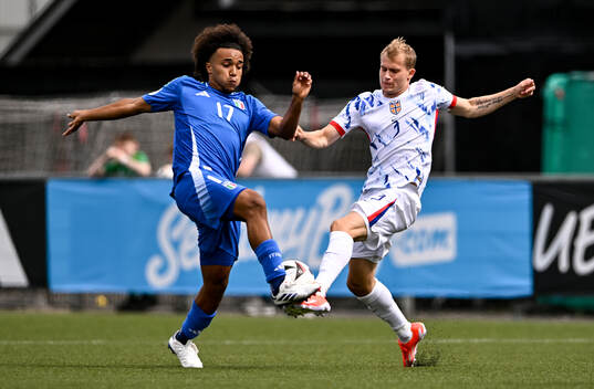 Aleksander Andresen of Norway in action against Aaron