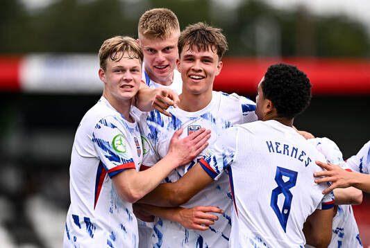 Daniel Braut of Norway celebrates with teammates