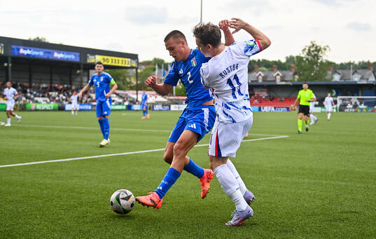 Vittorio Magni of Italy in action against Edvin Austbø of