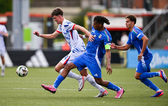Daniel Braut of Norway in action against Filippo Mane of