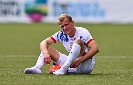 Aleksander Andresen of Norway dejected at the final whistle