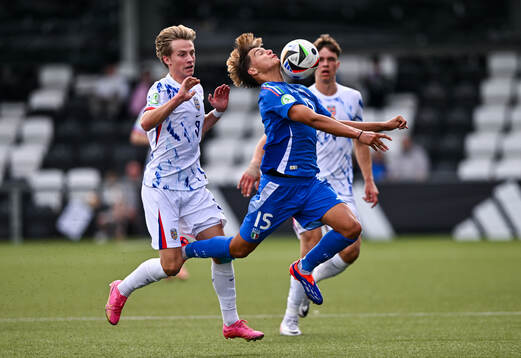 Jonas Harder of Italy in action against Benjamin Thoresen