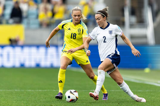 Fridolina Rolfö of Sweden and Lucy Bronze of England