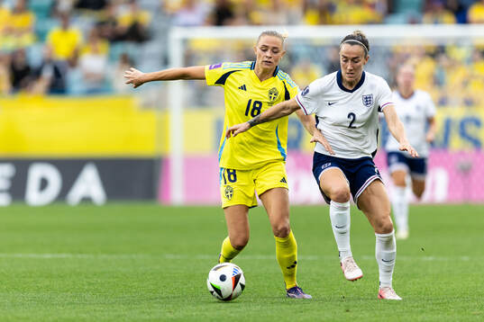 Fridolina Rolfö of Sweden and Lucy Bronze of England