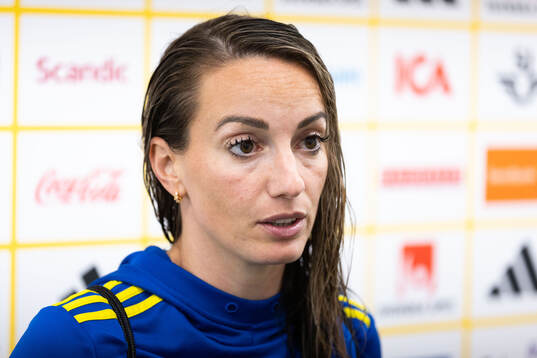 Kosovare Asllani of Sweden in mixed zone