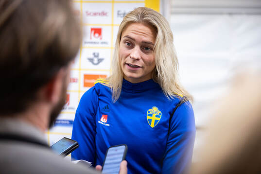 Fridolina Rolfö of Sweden in mixed zone