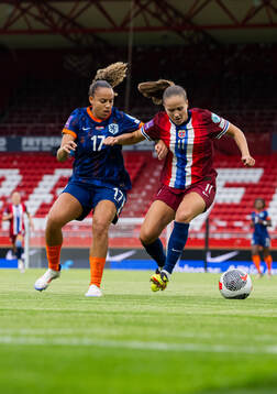 Chasity Grant of Netherlands and Guro Reiten of Norway