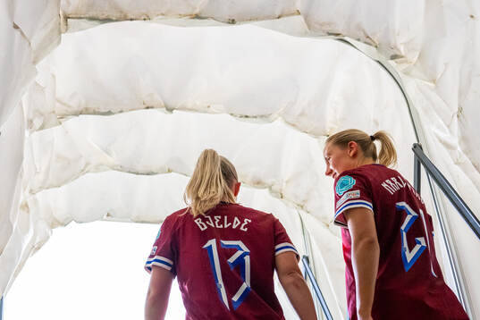 Thea Bjelde and Lisa Naalsund of Norway at half-time