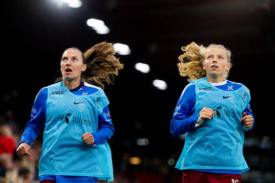 Marit Bratberg Lund and Justine Kielland of Norway warm up
