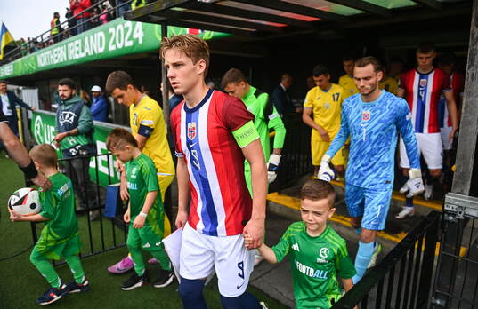 Norway captain Benjamin Thoresen Faraas leads his side out