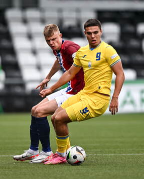 Matvii Ponomarenko of Ukraine in action against Simen Vatne