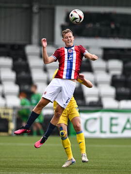 Filip Loftesnes-Bjune of Norway in action against Timur