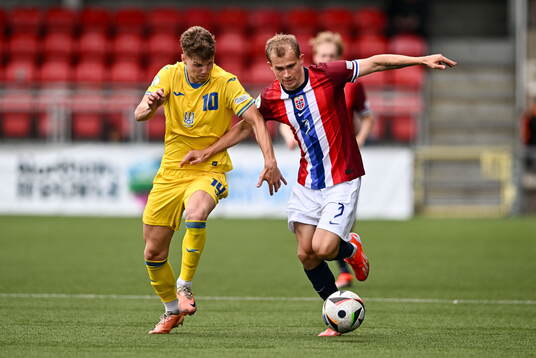 Aleksander Andresen of Norway in action against Andrii