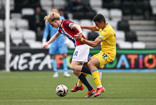 Sondre Granaas of Norway in action against Ramik Hadzhyiev