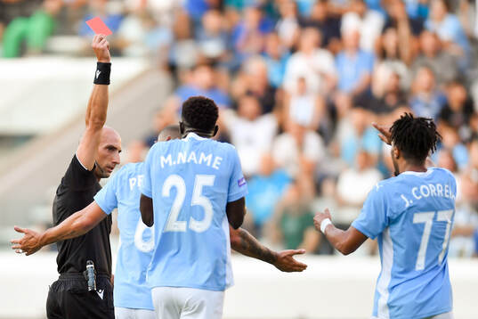 Joao Correia of Pafos receives a red card