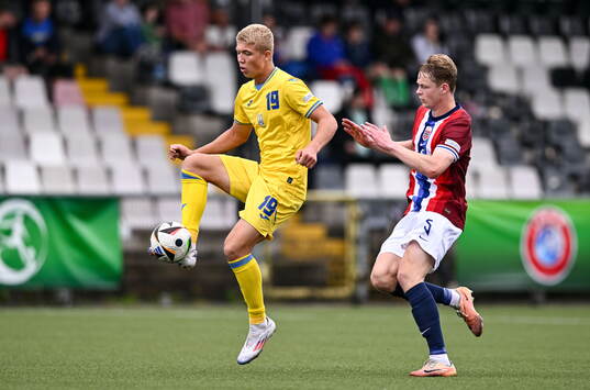 Dmytro Bohdanov of Ukraine in action against Rasmus Holten