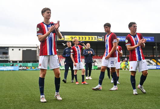 Norway players, including Sander Hestetun Kilen, left,