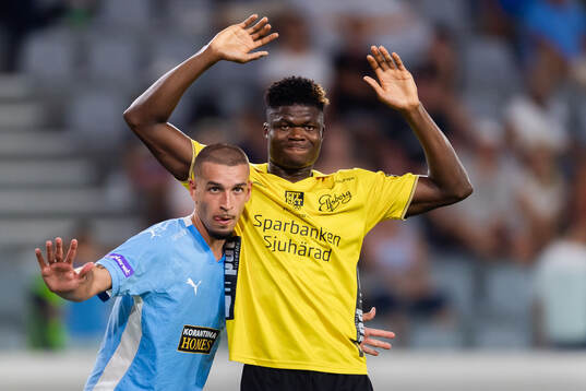Pedro Henrique Rocha Pelagio of Pafos and Terry Yegbe of