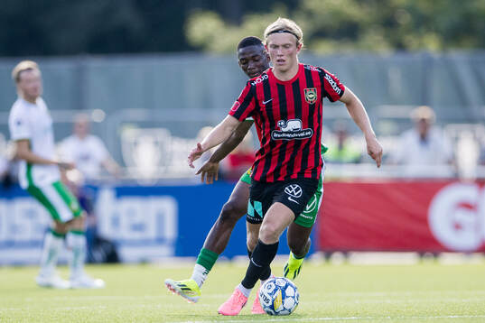 Brommapojkarnas Alexander Jensen och Hammarbys Bouzomana