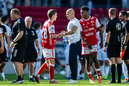 Kalmars Max Svensson och tränare Stefan Larsson jublar