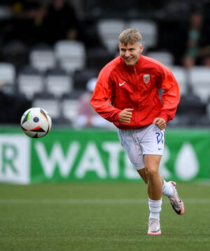 Kristoffer Haukas Steinset of Norway warms-up
