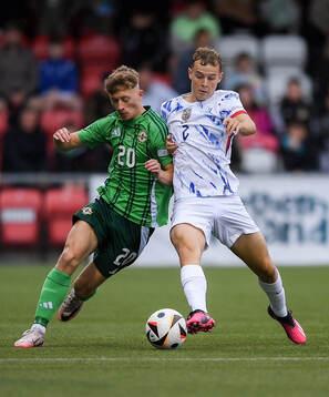 Filip Loftesnes-Bjune of Norway in action against Aodhan