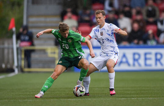 Filip Loftesnes-Bjune of Norway in action against Aodhan