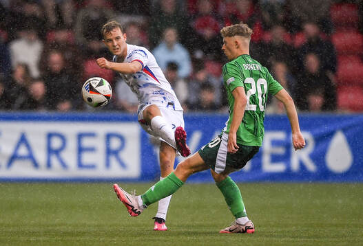 Filip Loftesnes-Bjune of Norway in action against Aodhan