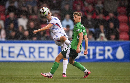 Filip Loftesnes-Bjune of Norway in action against Aodhan