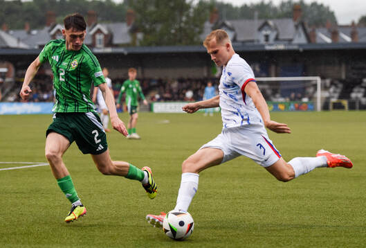 Alexander Andresen of Norway in action against Conor Barr
