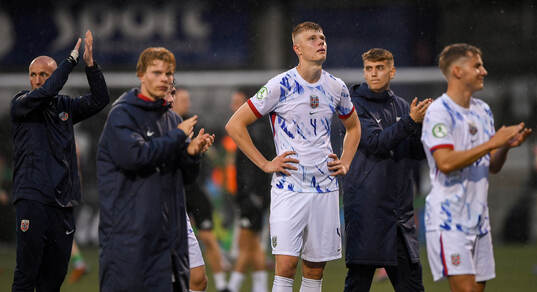 Norway players, including Rasmus Holten, centre,